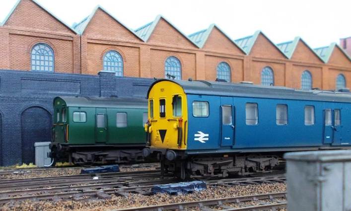 Visiting Kernow 2H Hastings unit no.1121. This model was weathered & renumbered by TMC from no.1122 (which was not equipped with roof lighting conduit). This is where it gets interesting for as-built no.1121 did not have lighting conduit either, only gaining these when its identity was swapped with no.1108 (sitting behind) in May 1974!
www.EwhurstGreen.com 
